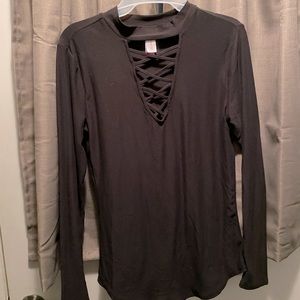 Never worn. Black stretch long sleeve.